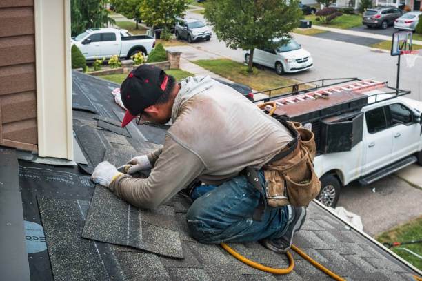 Professional Roofing technician working in Rainier, WA